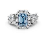 White gold Fancy Blue Emerald Cut Halo Diamond Ring with Milgrain and Bezel Accents on a Split Shank Band_24