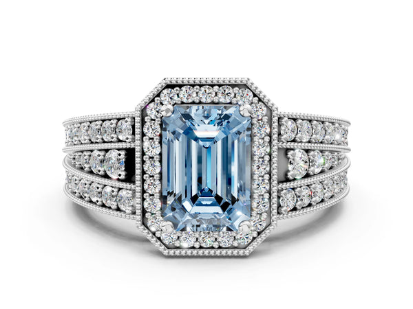 White gold Fancy Blue Emerald Cut Halo Diamond Split Shank Ring with Prong Setting