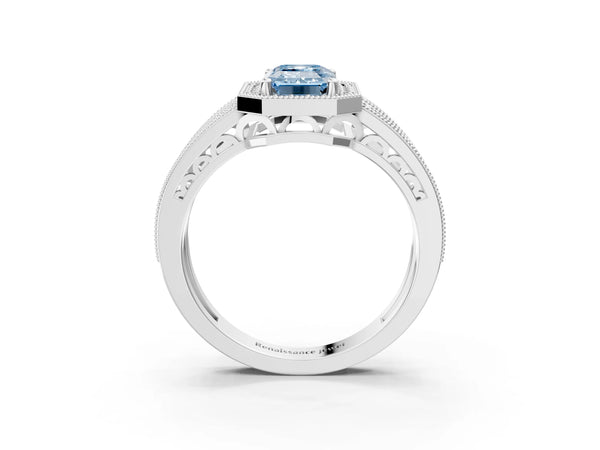 White gold Fancy Blue Emerald Cut Halo Diamond Split Shank Ring with Prong Setting