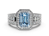 White gold Fancy Blue Emerald Cut Halo Diamond Split Shank Ring with Prong Setting