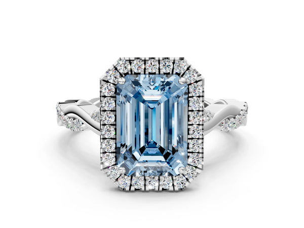 White gold Fancy Blue Emerald Cut Halo Twist Band with Four-Prong Setting