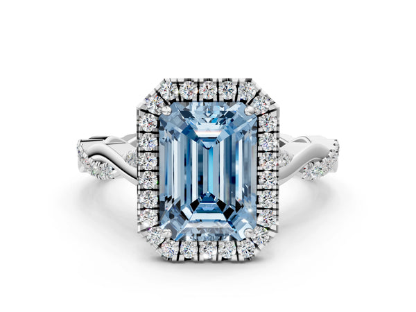 White gold Fancy Blue Emerald Cut Halo Twist Band with Four-Prong Setting