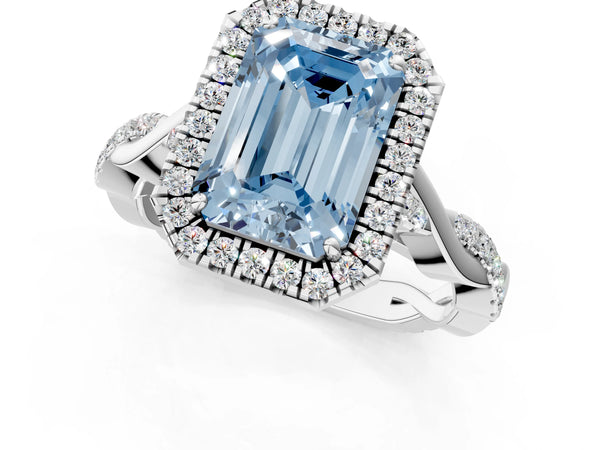 White gold Fancy Blue Emerald Cut Halo Twist Band with Four-Prong Setting
