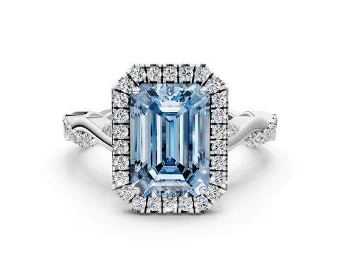White gold Fancy Blue Emerald Cut Halo Twist Band with Four-Prong Setting