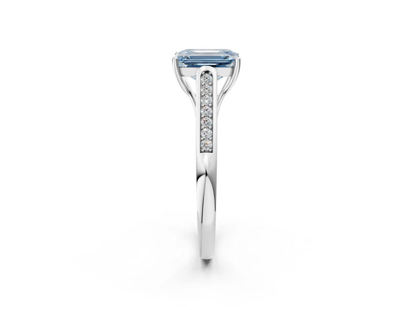 White gold Fancy Blue Emerald Cut Solitaire Cathedral Diamond Engagement Ring with Channel-Set Band and Four-Prong Setting