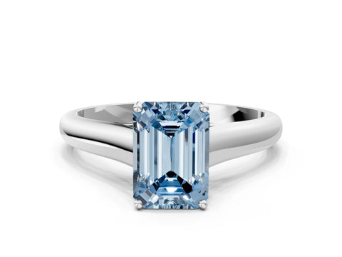White gold Fancy Blue Emerald Cut Solitaire Engagement Ring with Tapered Band and Four-Prong Setting_3