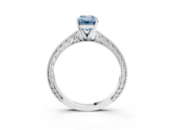 Platinum Fancy Blue Emerald Cut Solitaire Milgrain Engraved Band with Four-Prong Setting