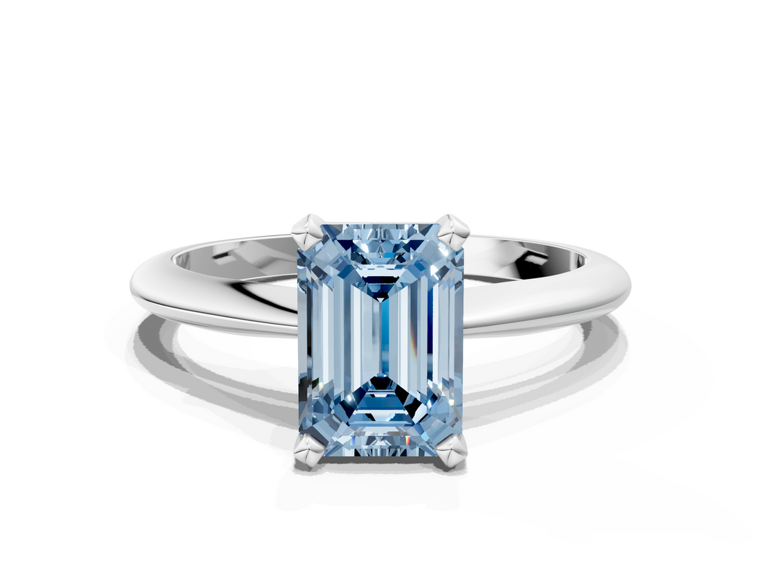 White gold Fancy Blue Emerald  Cut Solitaire Ring with Four-Prong Setting on a Classic Band_64