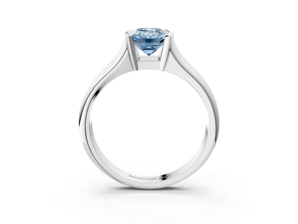 White gold Fancy Blue Emerald Cut Solitaire Tension Set Diamond Ring with Split Shank Band
