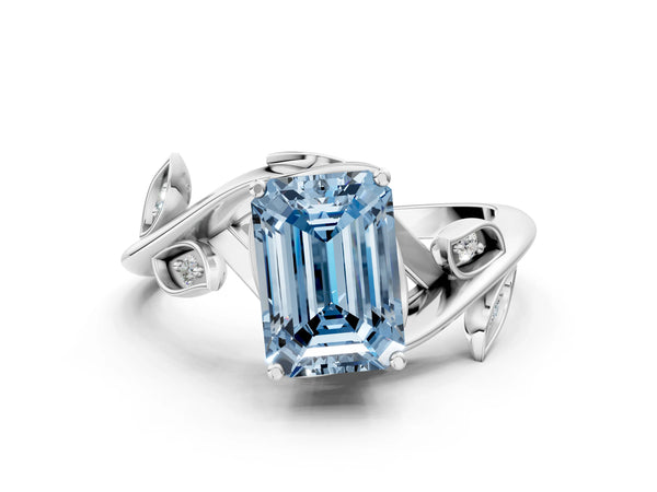 Platinum Fancy Blue Emerald Cut Solitaire Twist Engagement Ring with Leaf Accents and Prong Setting