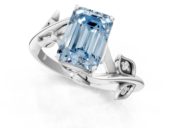 Platinum Fancy Blue Emerald Cut Solitaire Twist Engagement Ring with Leaf Accents and Prong Setting