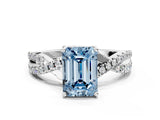 White gold Fancy Blue Emerald Cut Solitaire Twist Pave Diamond Engagement Ring with Prong Setting