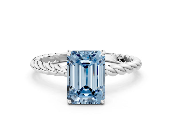 Platinum Fancy Blue Emerald Cut Solitaire Twisted Band 4-Prong Ring