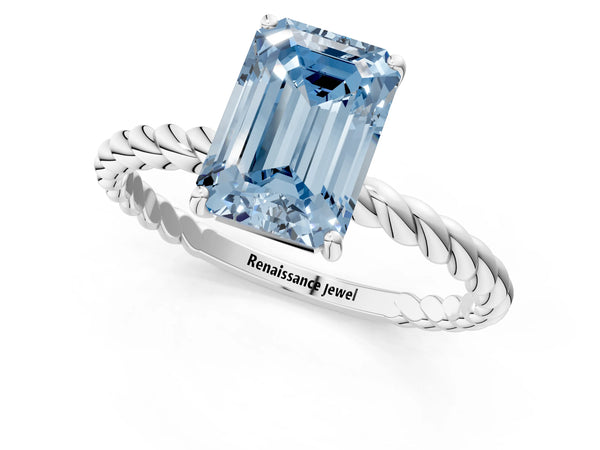 Platinum Fancy Blue Emerald Cut Solitaire Twisted Band 4-Prong Ring