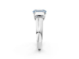 White gold Fancy Blue Emerald Cut Three-Stone Diamond Ring with Prong Setting on a Classic Band_2