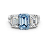 White gold Fancy Blue Emerald Cut Three-Stone Diamond Ring with Prong Setting on a Classic Band_30