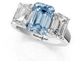 White gold Fancy Blue Emerald Cut Three-Stone Diamond Ring with Prong Setting on a Classic Band_31