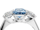 White gold Fancy Blue Emerald Cut Three-Stone Diamond Ring with Prong Setting on a Classic Band_34
