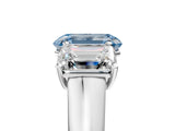 White gold Fancy Blue Emerald Cut Three-Stone Diamond Ring with Prong Setting on a Classic Band_35