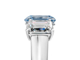 White gold Fancy Blue Emerald Cut Three-Stone Diamond Ring with Prong Setting on a Classic Band_35