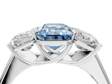 White gold Fancy Blue Emerald Cut Three-Stone Diamond Ring with Prong Setting on a Classic Band_4
