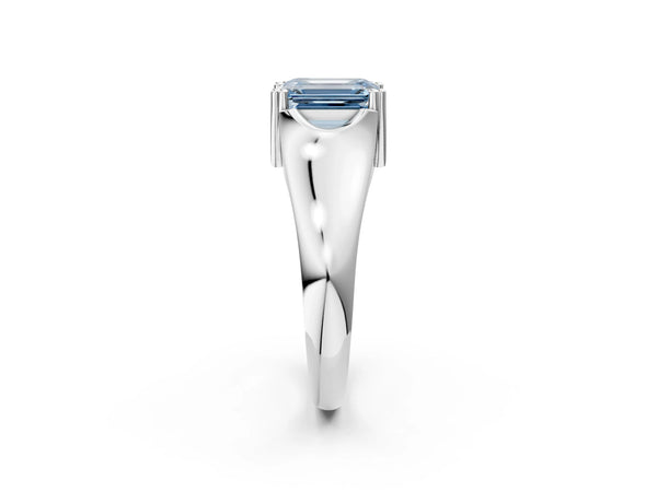 White gold Fancy Blue Emerald Cut Diamond Solitaire Ring with Wide Band and Prong Setting