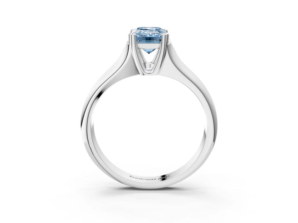White gold Fancy Blue Emerald Cut Diamond Solitaire Ring with Wide Band and Prong Setting