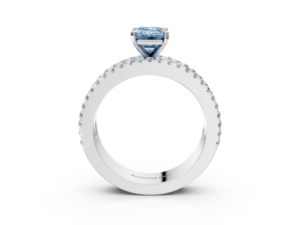 White gold Fancy Blue Emerald Cut Diamond Solitaire Ring with Pavé and Channel Set Band