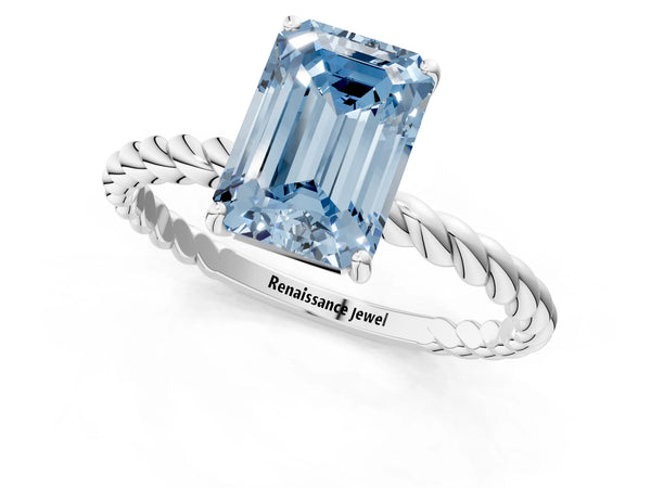 Platinum Fancy Blue Emerald  Solitaire Twist Band Ring with Four-Prong Setting