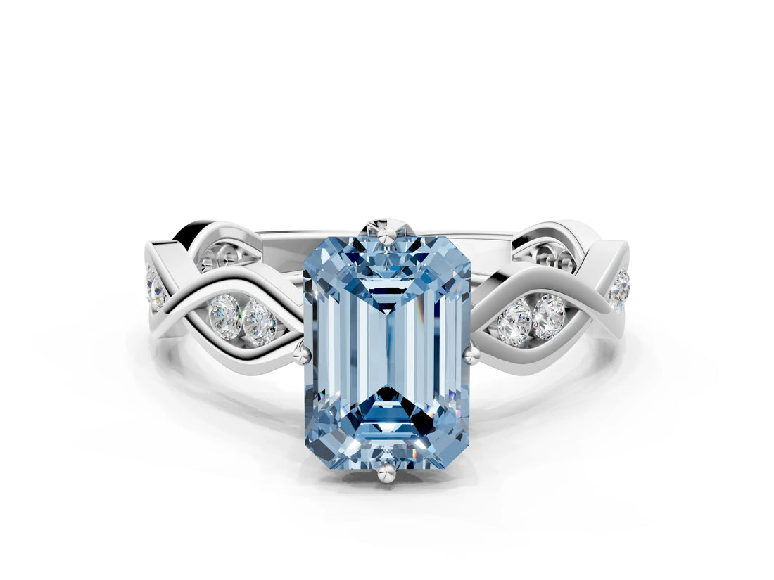 White gold Fancy Blue Emerald  Solitaire Twist Band with Leaf Prong Setting 1