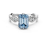 White gold Fancy Blue Emerald  Solitaire Twist Band with Leaf Prong Setting 1