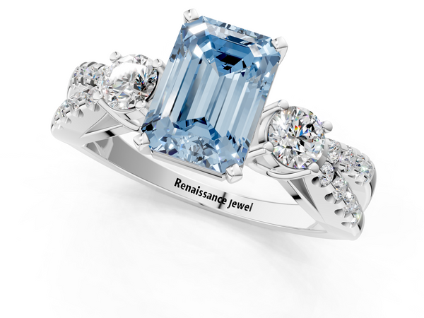 White gold Fancy Blue Emerald Cut Diamond Three-Stone Ring with Pavé Split Shank and Four-Prong Setting