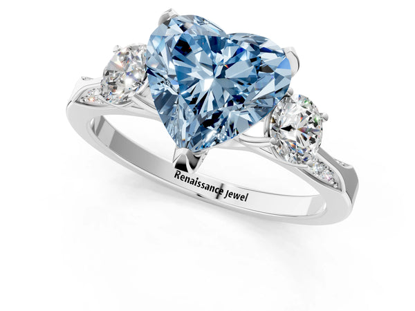 White gold Fancy Blue Heart Cut Brilliant Three-Stone Diamond Ring with Pavé Band and Four-Prong Setting