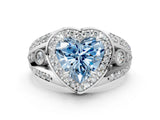 White gold Fancy Blue Heart Cut Diamond Halo Ring with Split Shank and Bezel Accents and Four-Prong Setting