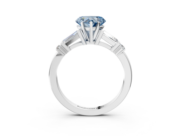 White gold Fancy Blue Heart  Cut Diamond Ring with Baguette Side Stones, Channel Set Band, and Four-Prong Setting