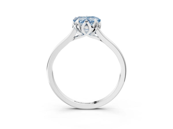 Platinum Fancy Blue Heart Cut Diamond Solitaire Ring with Flower Prong Setting and Classic Band