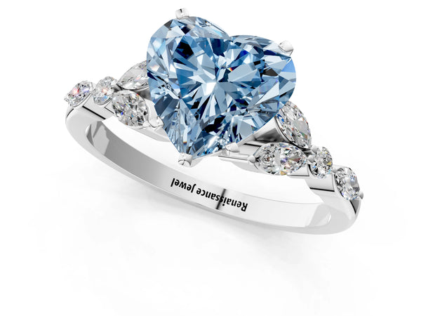 White gold Fancy Blue Heart Cut Diamond Solitaire Ring with Side Stones and Four-Prong Setting
