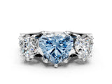 White gold Fancy Blue Heart Cut Diamond Three-Stone Ring with Channel Set Band and Four-Prong Setting_64