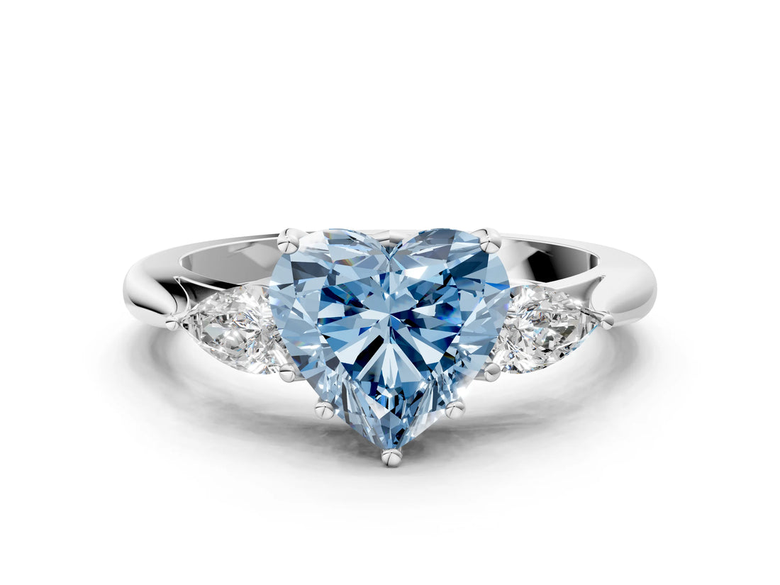 White gold Fancy Blue Heart Cut Diamond Three-Stone Ring with Pear  Side Stones and Prong Setting_119