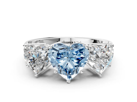 White gold Fancy Blue Heart Cut Diamond Three-Stone Ring with Prong Setting and Textured Band