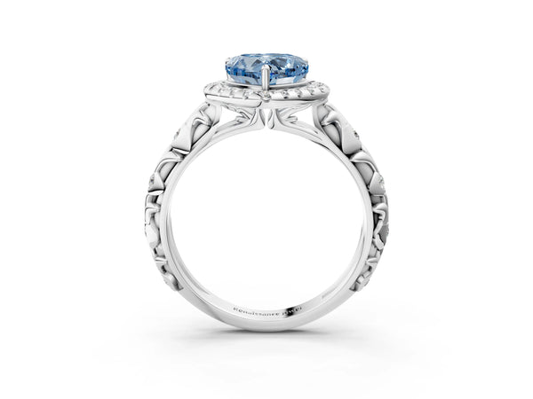White gold Fancy Blue Heart Cut Halo Diamond Solitaire with Filigree Band and Four-Prong Setting