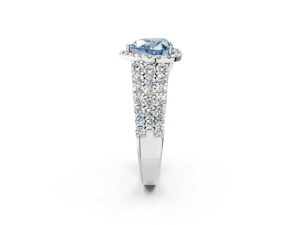 White gold Fancy Blue Heart Cut Halo Pavé Diamond Engagement Ring with Split Shank and Four-Prong Setting
