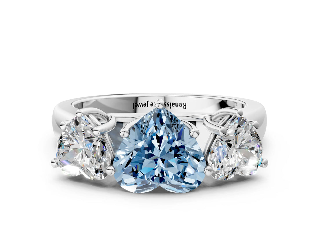 White gold Fancy Blue Heart Cut Three-Stone Diamond Ring with Prong Setting on a Classic Band_7