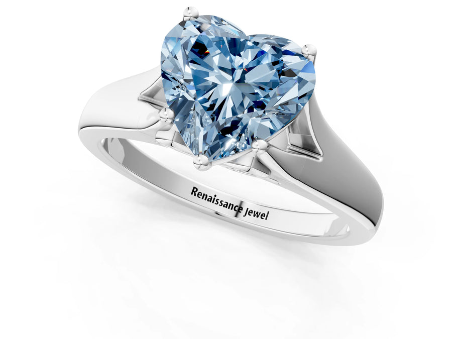 White gold Fancy Blue Heart  Solitaire Diamond Ring with Cathedral Band and Four-Prong Setting