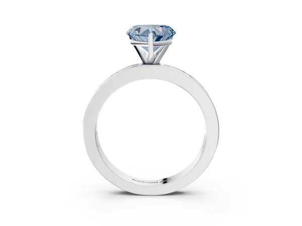 White gold Fancy Blue Heart  Solitaire Diamond Ring with Channel-Set Baguette Band and Four-Prong Setting