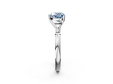 White gold Fancy Blue Heart  Solitaire with Tapered Baguette Side Stones on a Classic Band with Four-Prong Setting_130