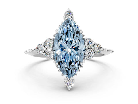 White gold Fancy Blue Marquise Cut Brilliant Diamond with Cluster Setting on a Beaded Band and Four-Prong Setting