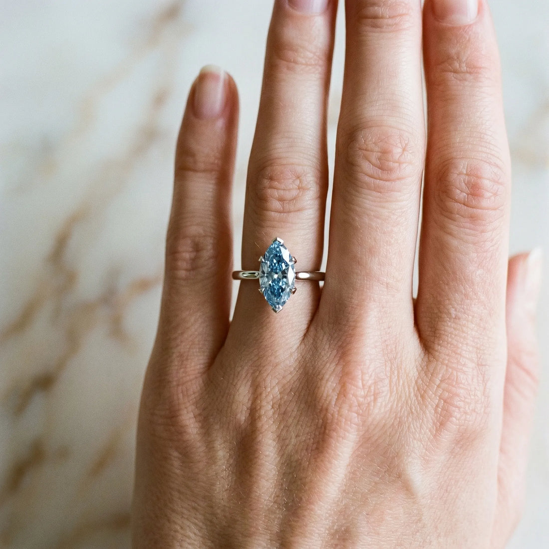 White gold Fancy Blue Marquise Cut Diamond Solitaire Ring with Flower Prong Setting and Classic Band_141