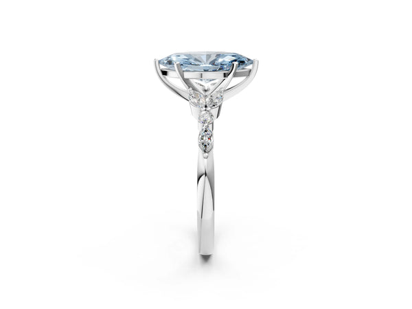 White gold Fancy Blue Marquise Cut Diamond Solitaire Ring with Side Stones and Four-Prong Setting