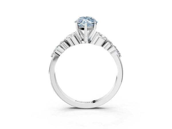 White gold Fancy Blue Marquise Cut Diamond Solitaire Ring with Side Stones and Four-Prong Setting